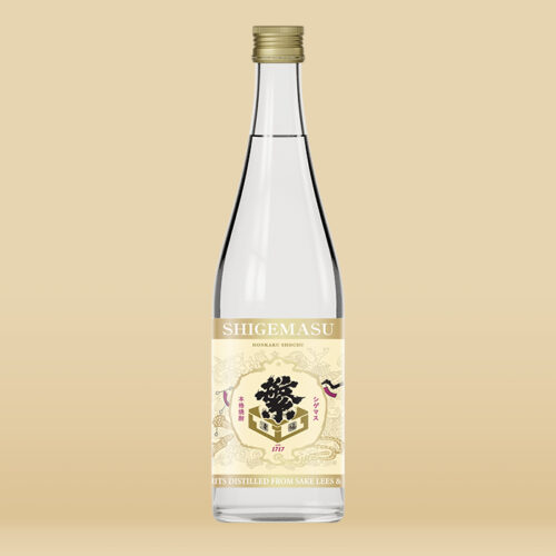 A clear glass bottle of Shigemasu Daiginjo Sake Lees Shochu